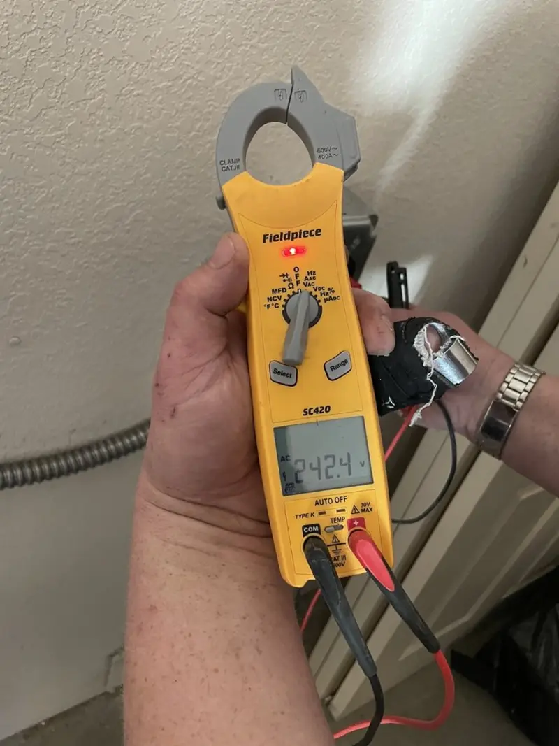 Voltage testing with clamp meter during Outlet Installation in Dahlonega
